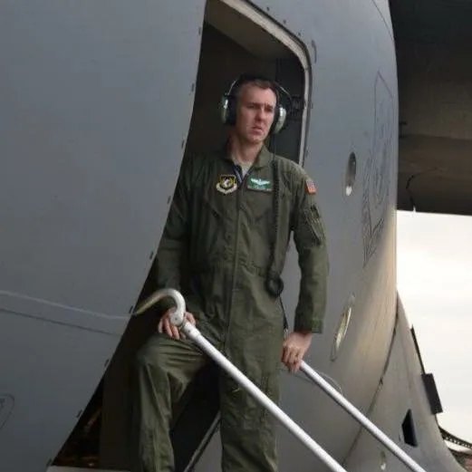 Greg Ford stepping off an aircraft